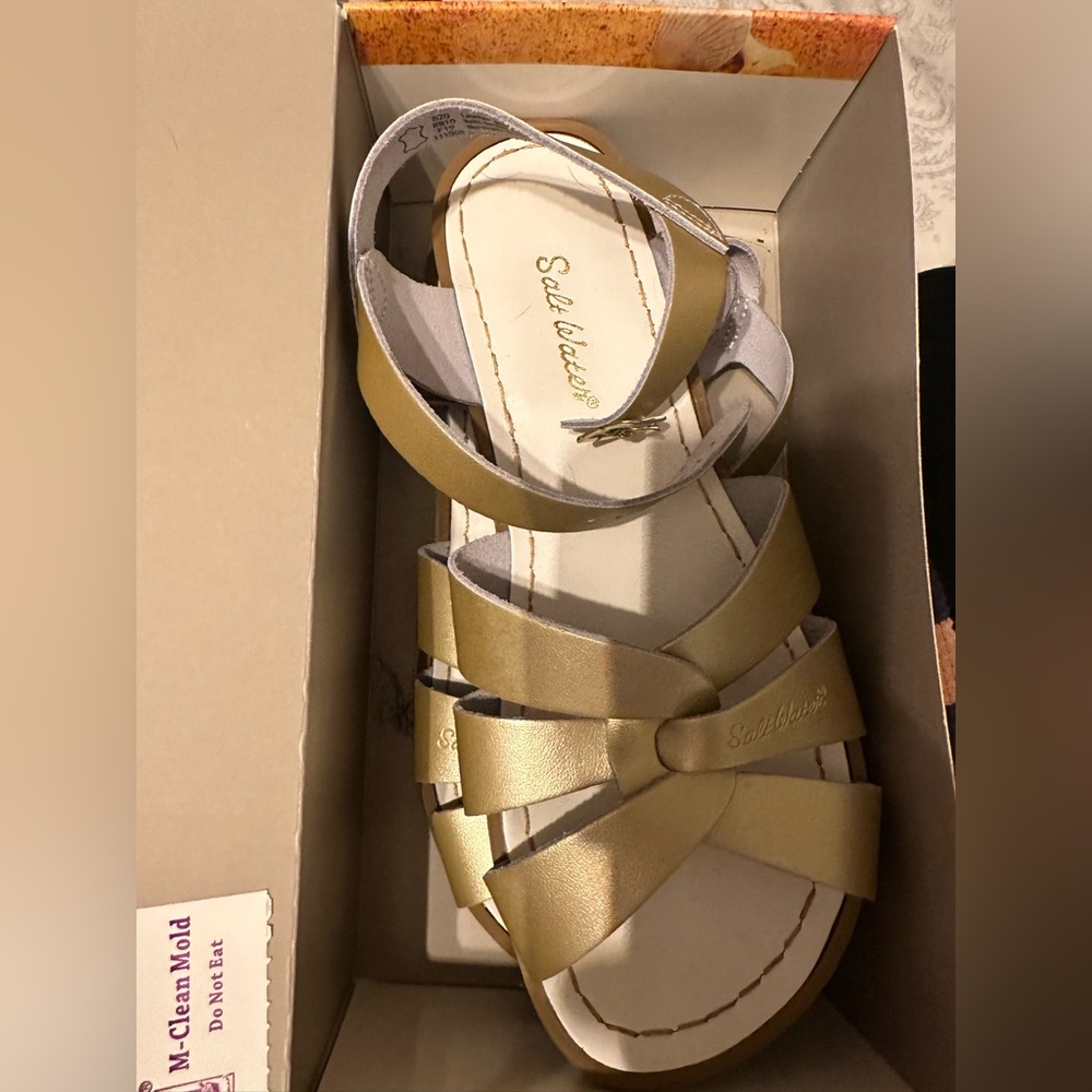 Women’s size 10 gold saltwater sandals